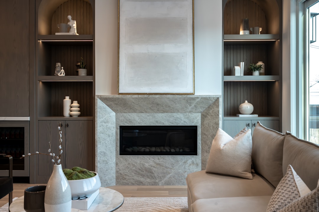 Modern living room with a fireplace and sofa.